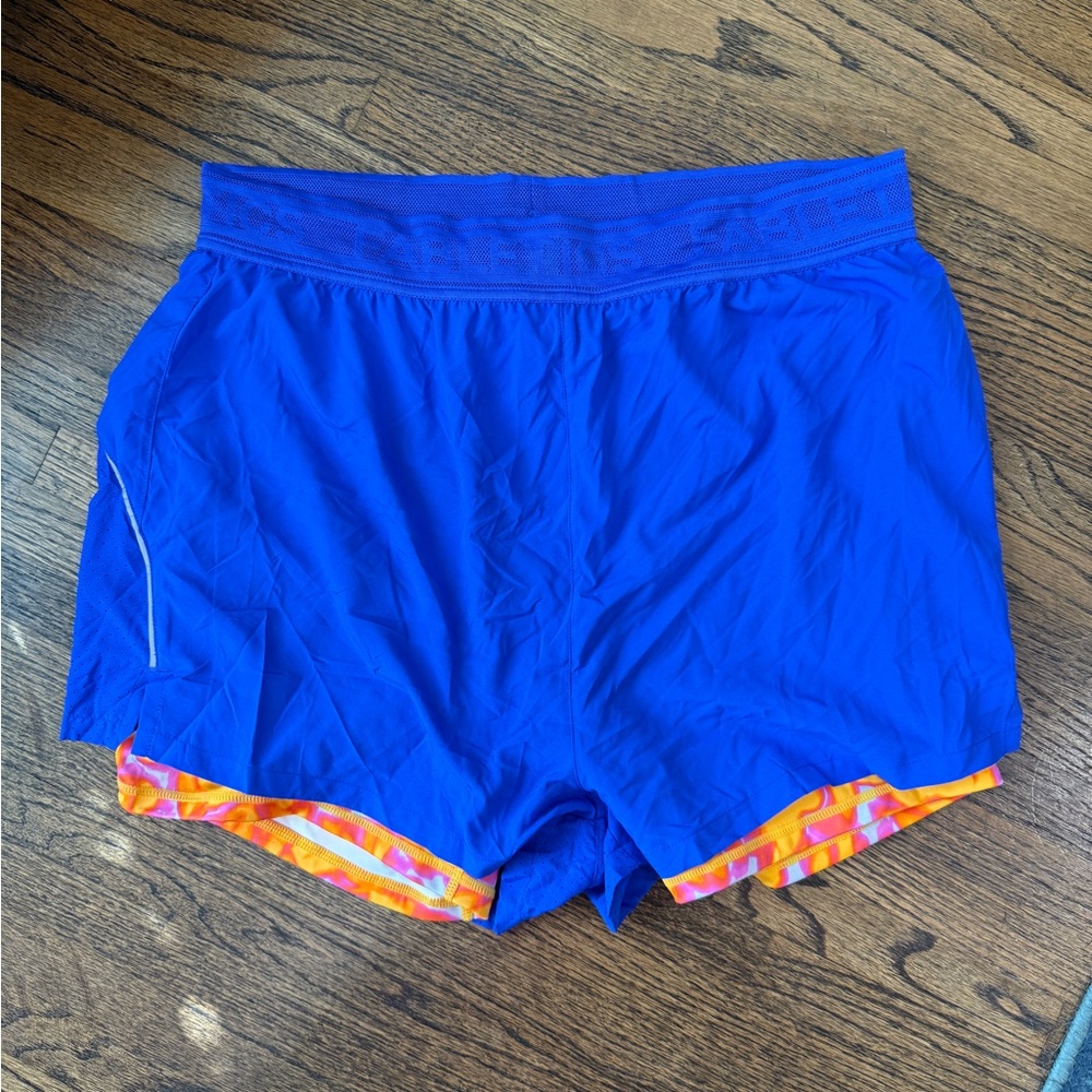 Fabletics Blue Athletic Shorts with Orange and Pink spandex built in